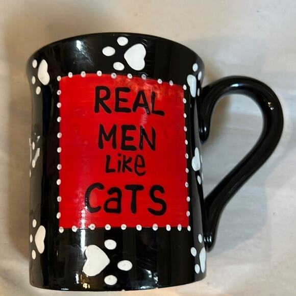 LORRIE VESSEY OUR NAME IS MUD‎ REAL MEN LIKE CATS CUP. - Picture 1 of 5
